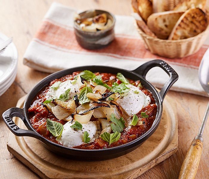 Roasted Onion Petals, Cumin-Spiced Tomato Sauce, Poached Eggs, Herbs, Grilled Baguette Toast
